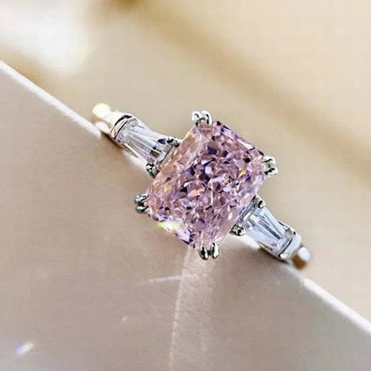 MyClosetAid pink cubic zirconia ring with a large rectangular pink stone and clear side accents
