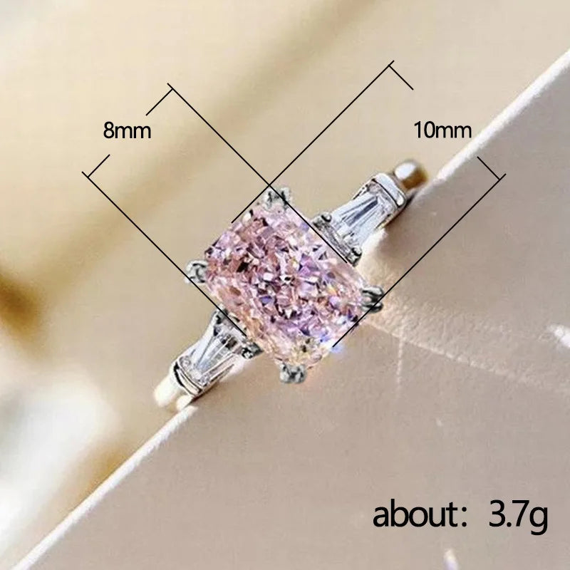 MyClosetAid pink cubic zirconia ring with 10mm by 8mm stone and silver band weighing about 3.7g