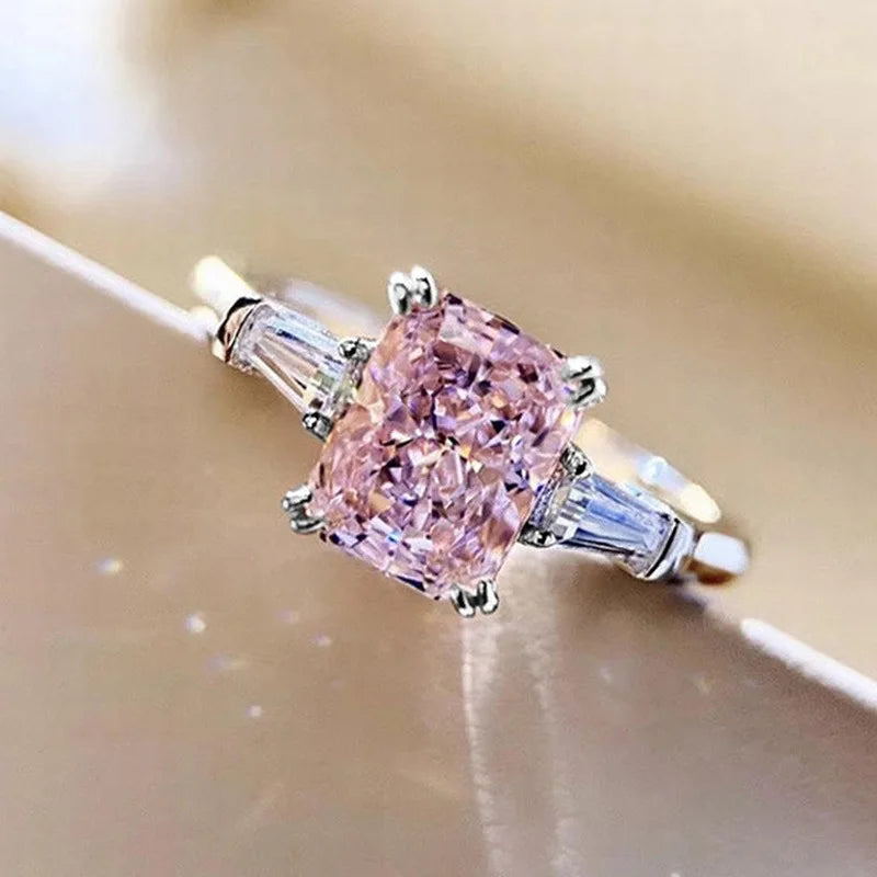 MyClosetAid pink cubic zirconia ring with silver band and side baguette stones